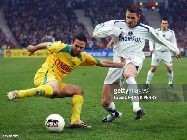 Nantes' French forward Frederic Da Rocha vies with Paris-Saint-Germain's French defender Sylvain Armand during their French L1 football match, 25...