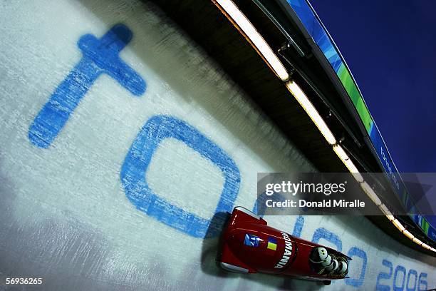 Pilot Nicolae Istrate and teammates Adrian Duminicel, Gabriel Popa and Ioan Danut Dovalciuc of Romania 1 compete in the Four Man Bobsleigh Final on...