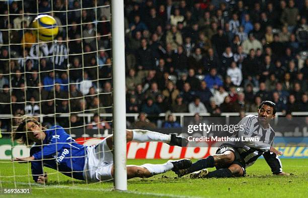 Nolberto Solano of Newcastle beats Mikel Arteta of Everton to score a goal during the Barclays Premiership match between Newcastle United and Everton...