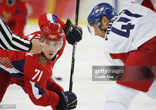 Ilya Kovalchuk of Russia and Vaclav Prospal of Czech Republic face off during the bronze medal match of the men's ice hockey match between Russia and...