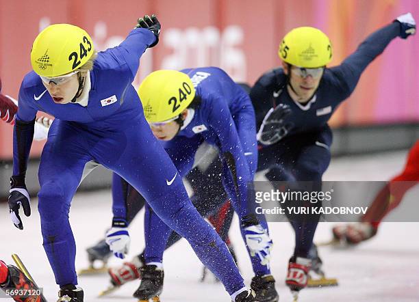 Team South Korea compete in the mens' 5000m relay final during the short track competition at the 2006 Winter Olympics, 25 February 2006 at the...