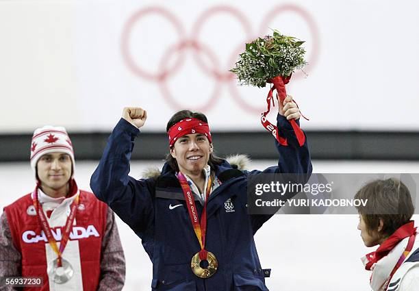 Gold medalist US Apollo Anton Ohno , Canada's Francois-Louis Tremblay and bronze medalist South Korea's Ahn Hyun-Soo pose on the podium of the men's...