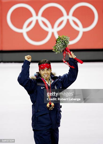 Apolo Anton Ohno of the United States celebrates with the gold medal in the men's 500 meter in Short Track Speed Skating on Day 15 of the Turin 2006...