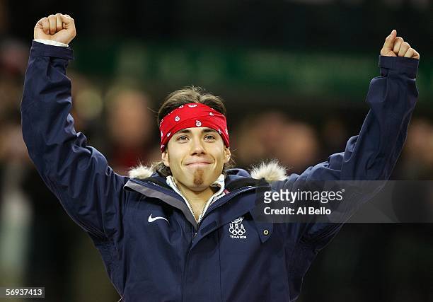 Apolo Anton Ohno of the United States celebrates during the gold medal ceremony for the men's 500 meter in Short Track Speed Skating on Day 15 of the...
