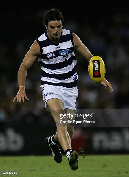 Matthew Scarlett of the Cats is in action during the round one NAB Cup match between the Carlton Blues and the Geelong Cats at the Telstra Dome...
