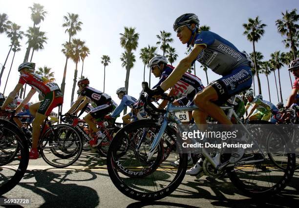 Janez Brajkovic of Slovenia and riding for the Discovery Channel Pro Cycling Team rolls along the beach as the peloton leaves the start for Stage Six...