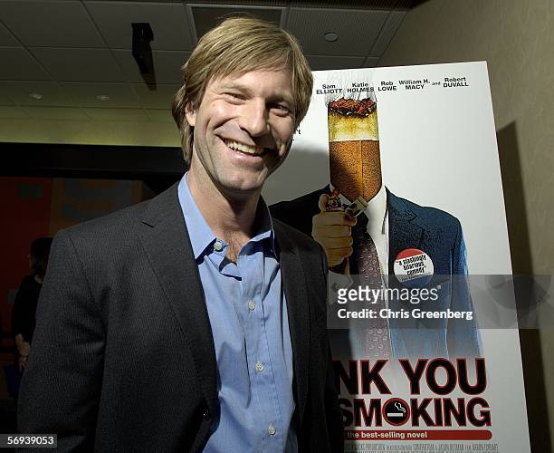 Actor Aaron Eckhart, co-star of the Jason Reitman film "Thank You For Smoking," pauses for photographs after introducing the film to an audience on...