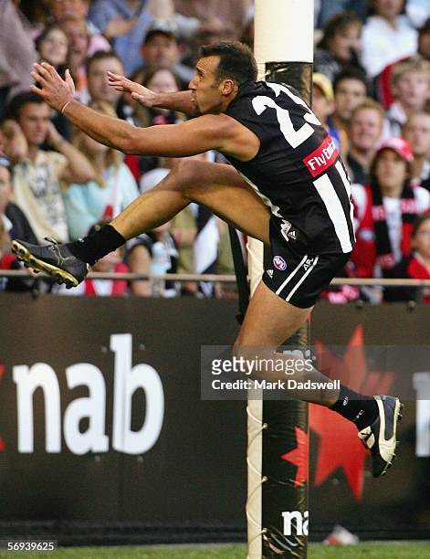 Anthony Rocca for the Magpies kicks a goal during the NAB Cup Round one match between the Collingwood Magpies and the St Kilda Saints at the Telstra...