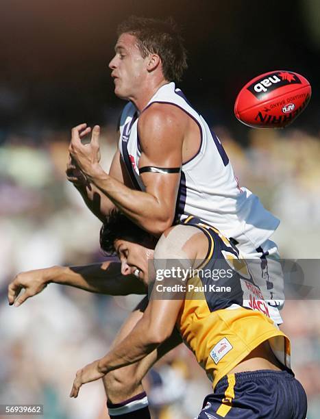 Steven Dodd of the Dockers contests a mark with Andrew Embley of the Eagles during the round one NAB Cup match between the West Coast Eagles and the...