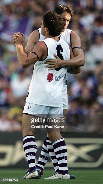 Paul Medhurst and Luke McPharlin of the Dockers celebrate a goal during the round one NAB Cup match between the West Coast Eagles and the Fremantle...