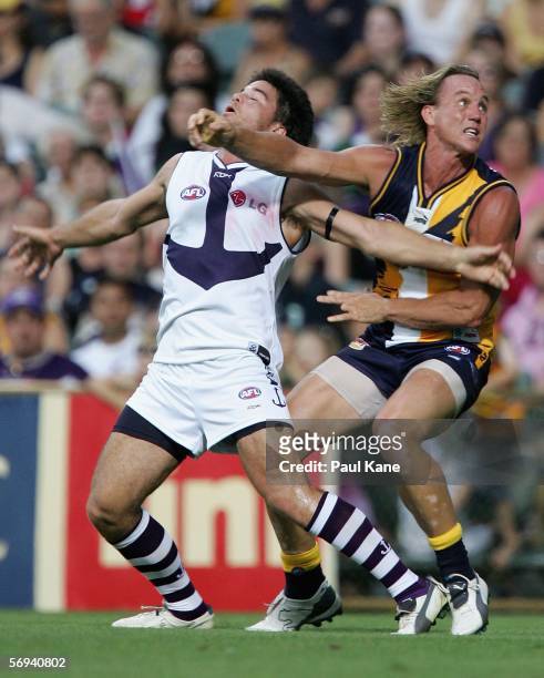 Daniel Chick of the Eagles contests the ball with Paul Medhurst of the Dockers during the round one NAB Cup match between the West Coast Eagles and...