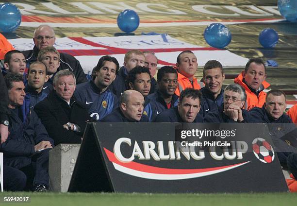 Ruud Van Nistelrooy of Manchester United watches the action from the bench during the Carling Cup Final match between Manchester United and Wigan...
