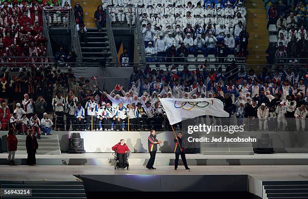 Sergio Chiamparino, the mayor of Turin hands over the Olympic flag to Sam Sullivan, the mayor of Vancouver during the Closing Ceremony of the Turin...