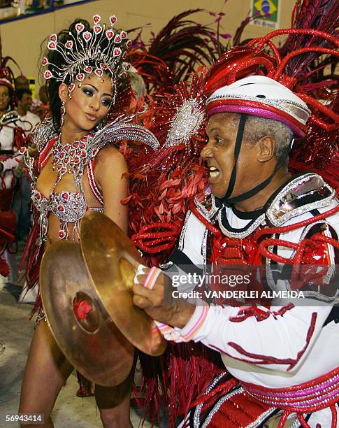 Rio de Janeiro, BRAZIL: Carol Castro, Queen of the Drums of Academicos do Salgueiro samba school performs ahead of the musicians as their school...