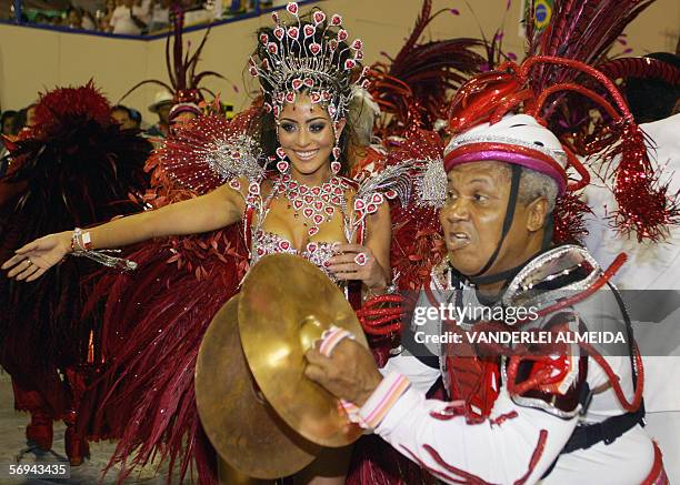 Rio de Janeiro, BRAZIL: Carol Castro, Queen of the Drums of Academicos do Salgueiro samba school performs ahead of the musicians as their school...