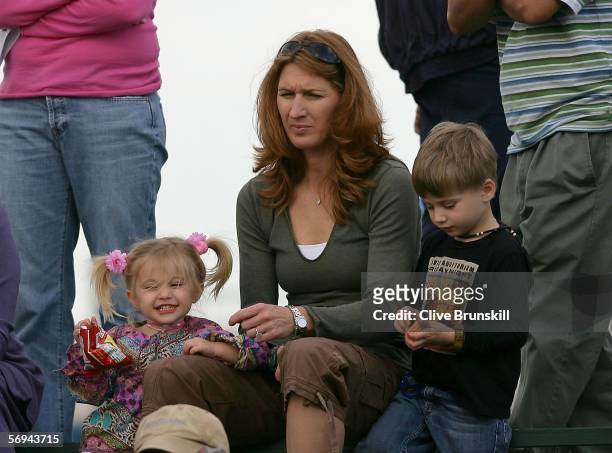 Steffi Graf , and her children Jaz Elle and Jaden Gil watch qualifying for the Tennis Channel Open at Darling Tennis Center February 26, 2006 in Las...