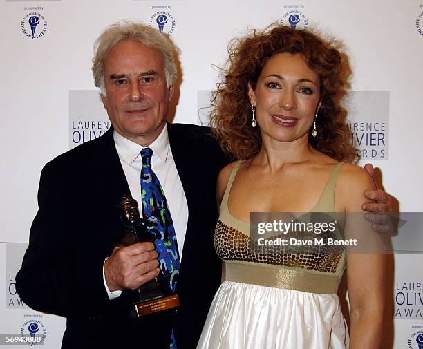 Theatre director Richard Eyre, winner of the Best Director Award for Hedda Gabler and actress Alex Kingston pose in the Awards Room at the Laurence...