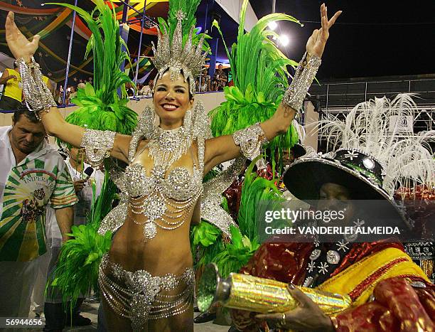 Rio de Janeiro, BRAZIL: Luciana Gimenez, the queen of the drums of the Imperatriz Leopoldinense samba school, performs ahead of the musicians while...