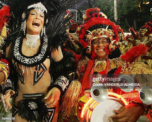 Rio de Janeiro, BRAZIL: Susana Vieira the queen of the drums of Academicos do Grande Rio samba school performs ahead of the musicians while their...