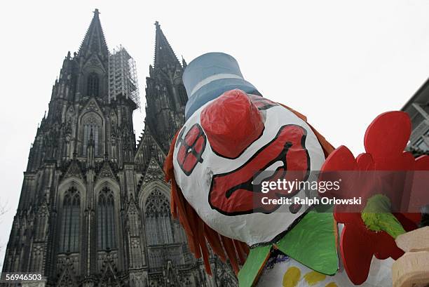 Paper-mache figure is pictured in front of the Koelner Dom during the carnival parade on February 27, 2006 in Cologne, Germany. Hundreds of thousands...