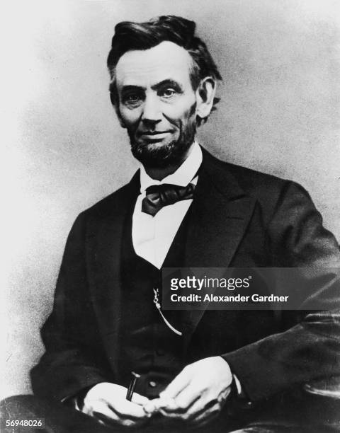 Portrait of American President Abraham Lincoln , the sixteenth President of the United States, dressed in a suit and bow tie, April 9, 1865. Five...