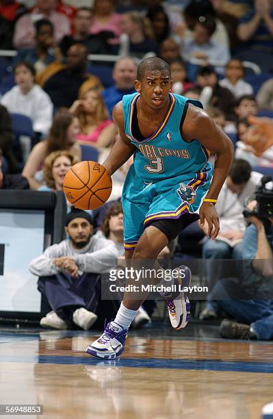 Chris Paul of the New Orleans/Oklahoma City Hornets moves the ball during the game with the Washington Wizards on January 20, 2006 at the MCI Center...
