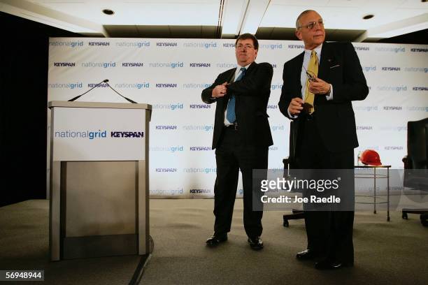 Michael E. Jesanis , president and CEO of National Grid USA and Robert B. Catell , chairman and CEO of KeySpan, attend a news conference to announce...