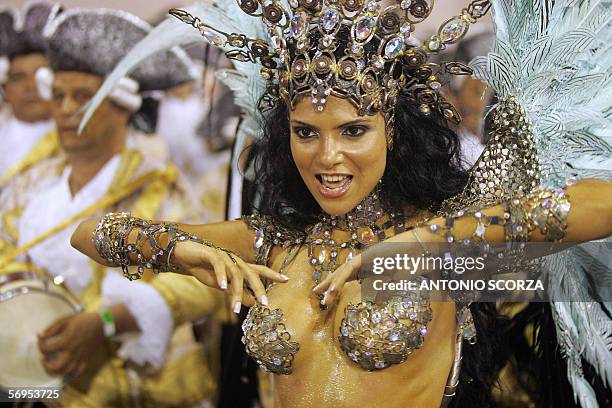 Rio de Janeiro, BRAZIL: Fabia Borges, queen of the drums of Imperio da Tijuca samba school performs ahead the musicians at the sambodrome avenue, 28...
