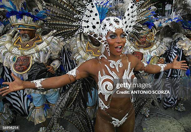 Rio de Janeiro, BRAZIL: Adriana Bombom, Queen of the Drums of Portela samba school performs ahead of the musicians at the sambodrome avenue, 28...
