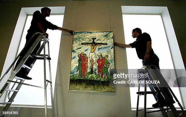 United Kingdom: A painting of Jesus Christ, crucified on the cross entitled 'Crucifixion' by Goan artist Francis Newton Souza is exhibited at Bonhams...