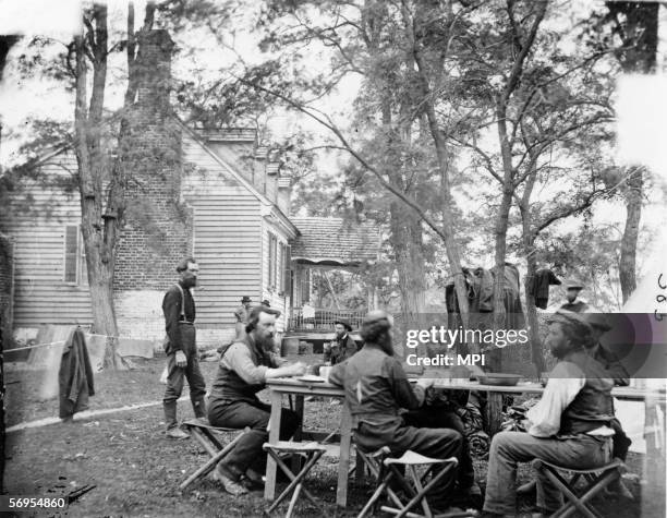 Allan Pinkerton , Scottish-born founder of the Pinkerton National Detective Agency, with some of his agents, circa 1862. Pinkerton served as head of...