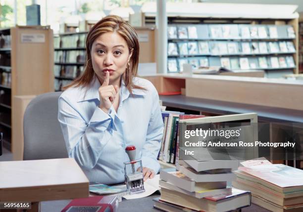 librarian signaling quiet - librarian stock pictures, royalty-free photos & images