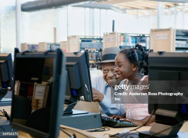 People Using Library Computers 866 Family Library Fun Stock Photos, High-Res Pictures, and Images ...