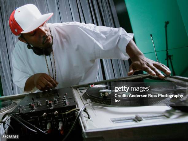 dj playing music - black dj stock pictures, royalty-free photos & images