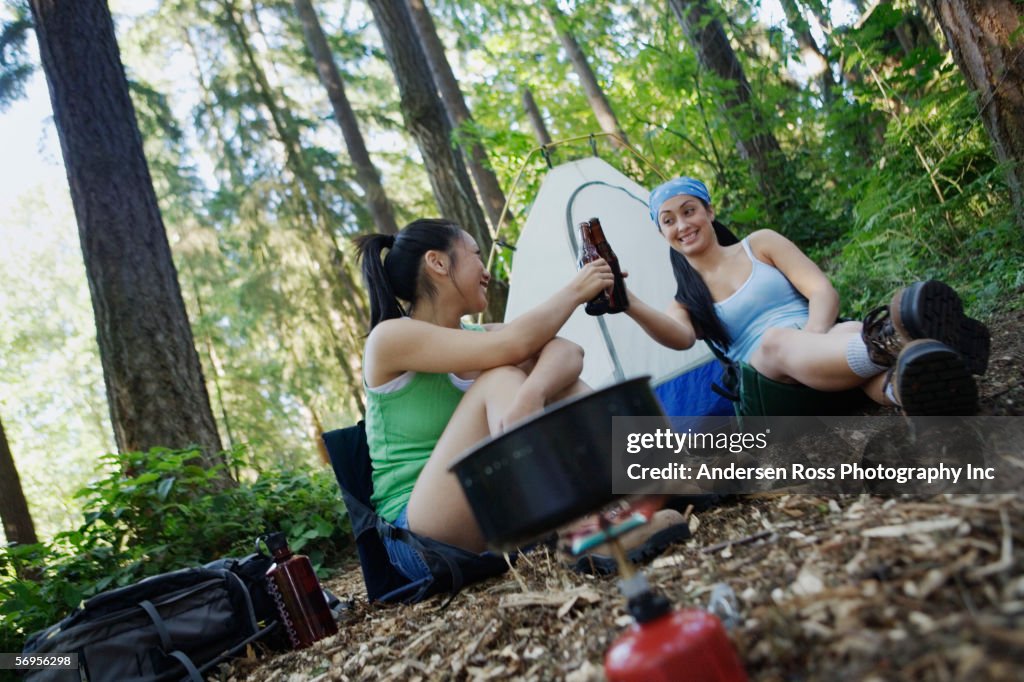 Women relaxing at campsite