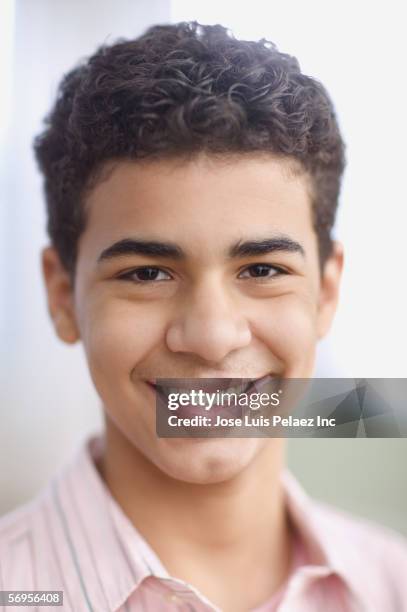 portrait of teenage boy smiling - puerto rican ethnicity stockfoto's en -beelden