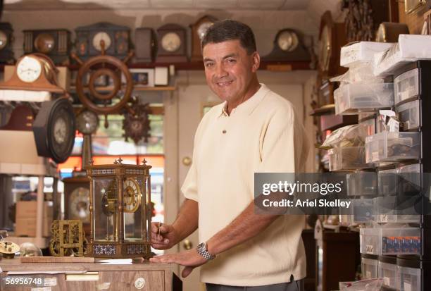 Man Fixing Clock Man Repairing Clock Photos and Premium High Res Pictures - Getty Images