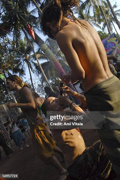 Young travellers party on a beach, Febraury 26, 2006 in the Indian resort of Goa. The tiny Indian state became known as a hippie heaven in the 1960's...