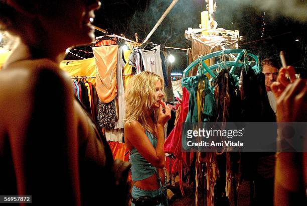 Young travellers enjoy a night market on a beach, Febraury 25, 2006 in the Indian resort of Goa. The tiny Indian state became known as a hippie...