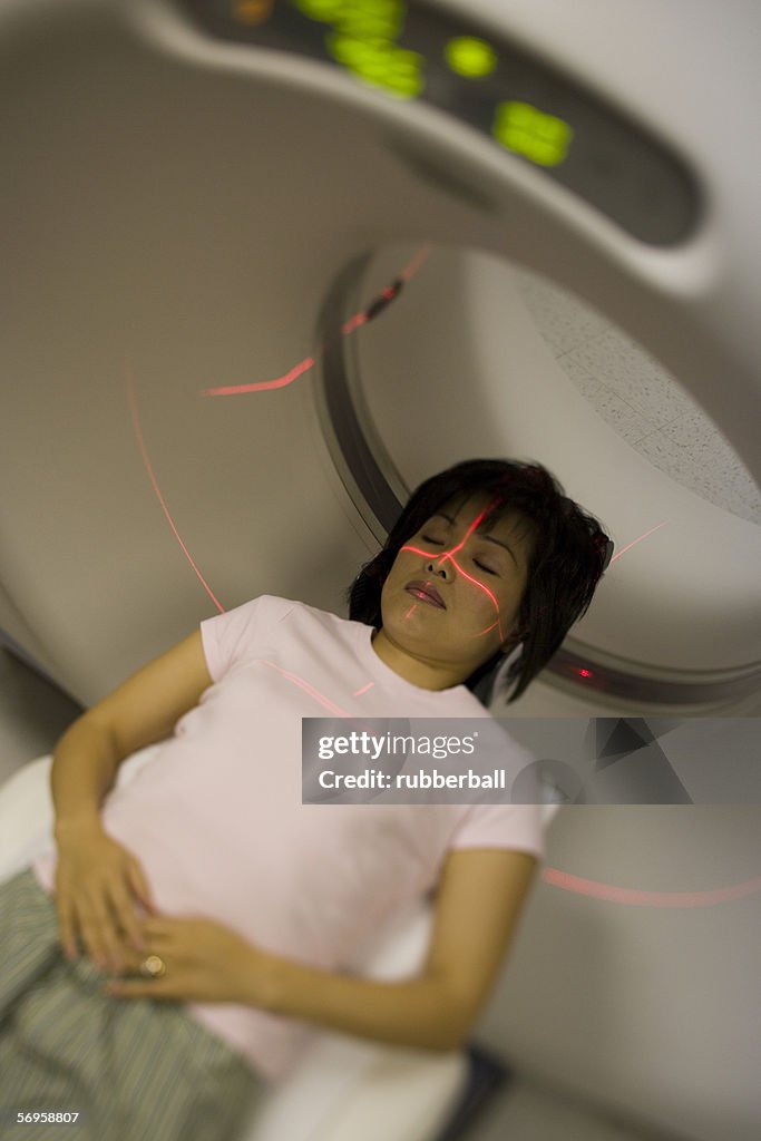 High angle view of a female patient getting an MRI scan