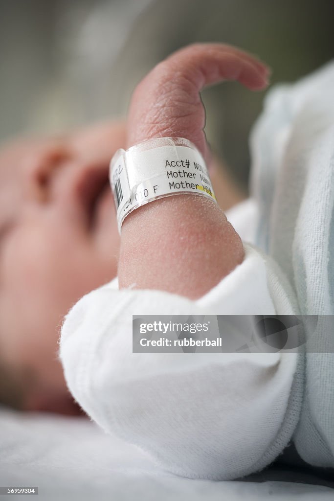 Close-up of a wristband on baby's hand