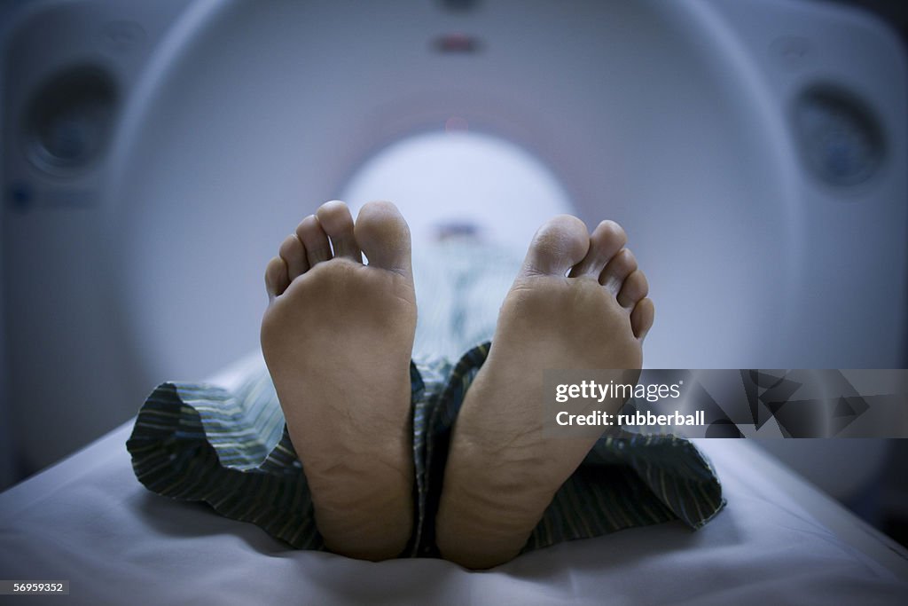 Close-up of a person getting an CAT scan