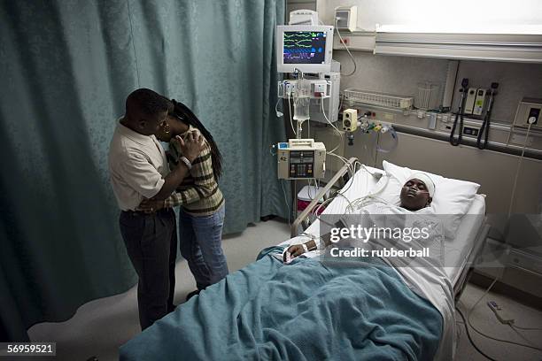 high angle view of parents in a hospital with their son - father confident secure reliable leader stock pictures, royalty-free photos & images