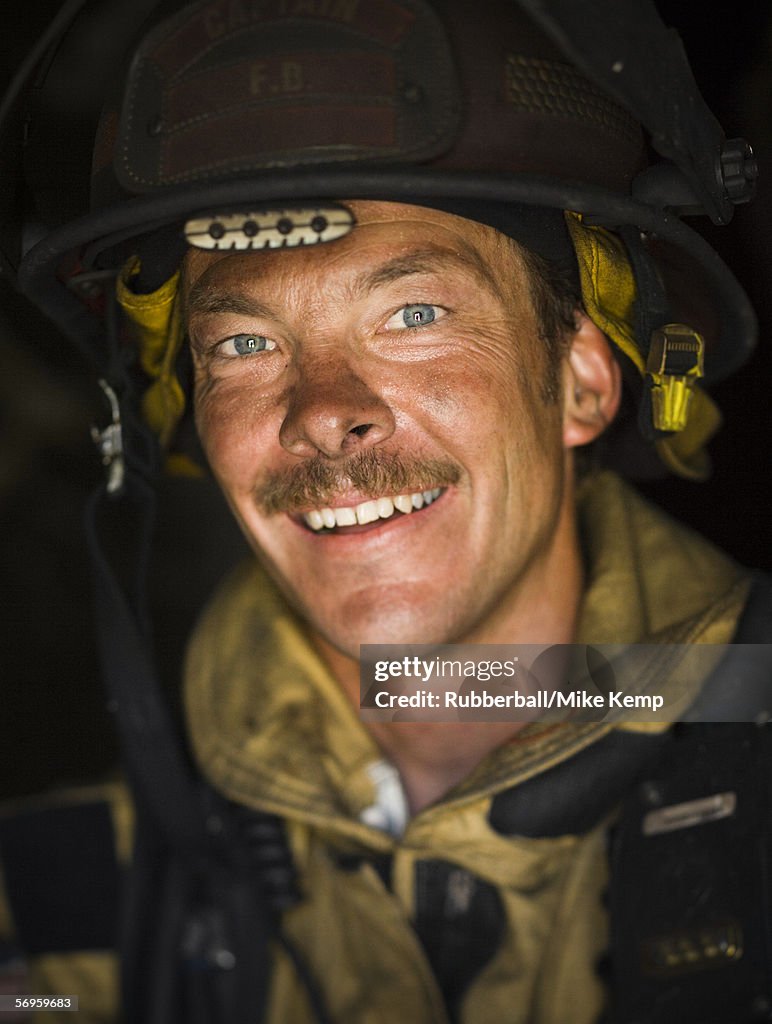 Close-up of a firefighter smiling