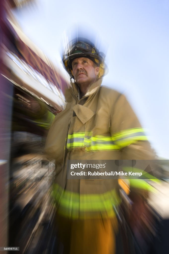 Low angle view of a firefighter