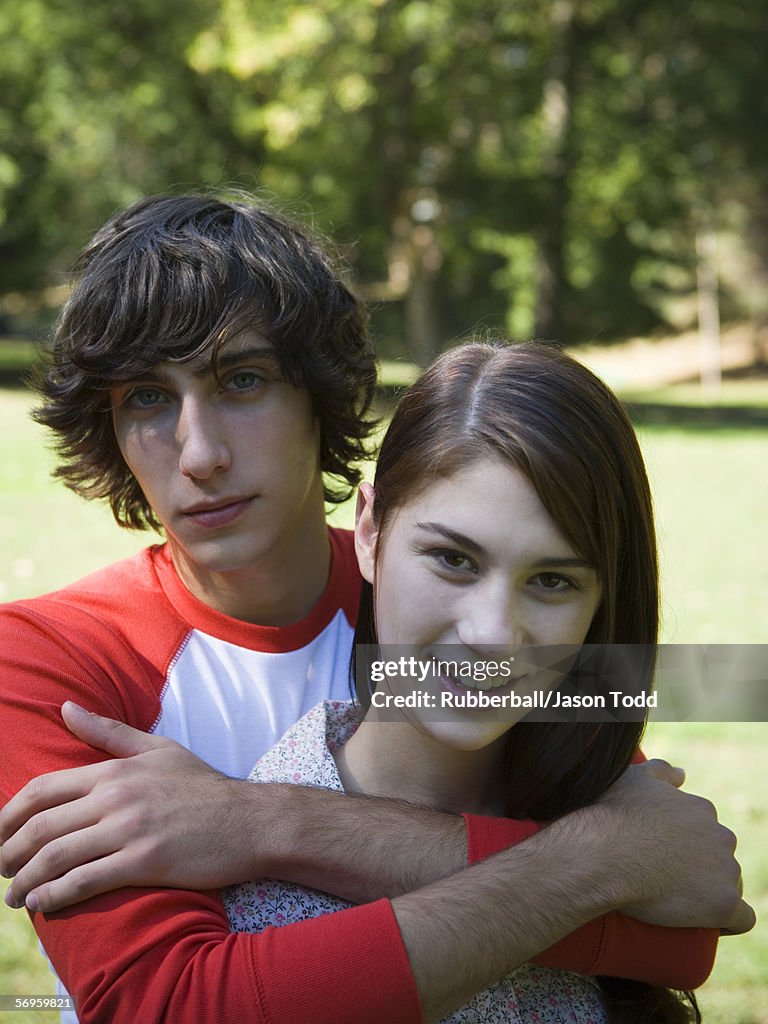 Close-up of a teenage couple in the park