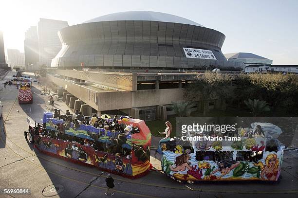 Floats pass the Superdome before the beginning of the Zulu Parade during Fat Tuesday Mardi Gras festivities February 28, 2006 in New Orleans. New...