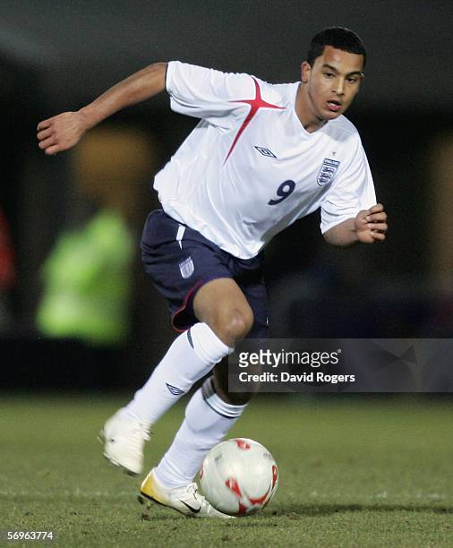 Theo Walcott of England runs with the ball during the under 19 International between England and Slovakia at The Sixfields Stadium on February 28,...