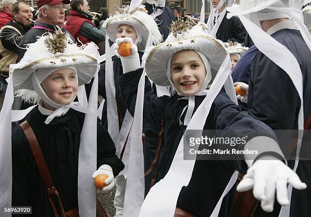 Revellers celebrate the Binche Mardi Gras, which has been recently granted World Heritage status by UNESCO, on February 28, 2006 in Binche, Belgium.