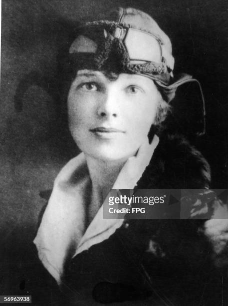 American aviator Amelia Earhart poses for a portrait some time shortly before her non-stop flight from Newfoundland to Wales with pilot Wilmer...
